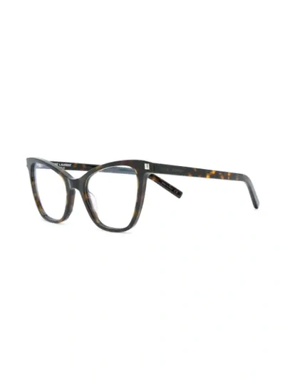 Shop Saint Laurent Cat Eye Glasses In Brown