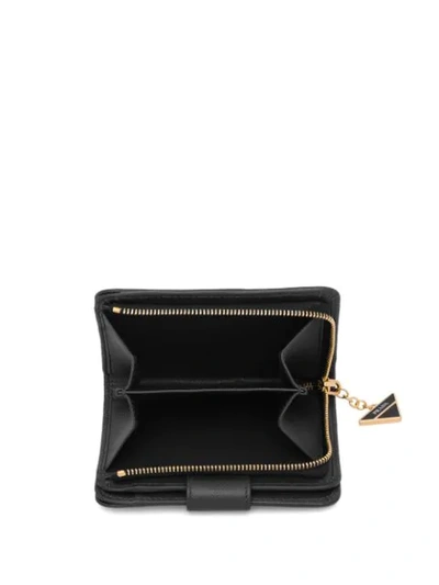 Shop Prada Charm Saffiano Wallet In Black