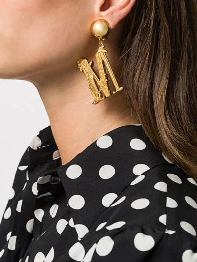 Shop Moschino M Logo Clip-on Earrings In Gold