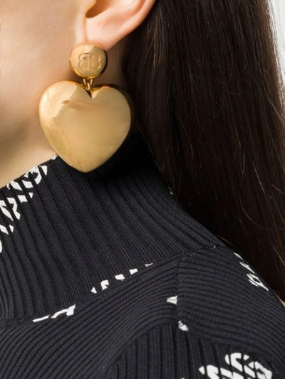 Shop Balenciaga Bb Heart Earrings In Gold