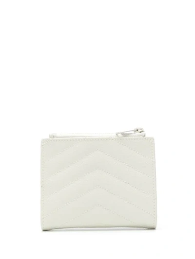 Shop Saint Laurent Quilted Monogram Wallet In White