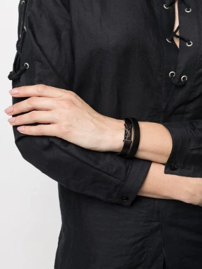 Shop Saint Laurent Opyum Logo Plaque Bracelet In Black