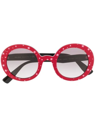 Shop Miu Miu Circle Frame Star Print Sunglasses In Red