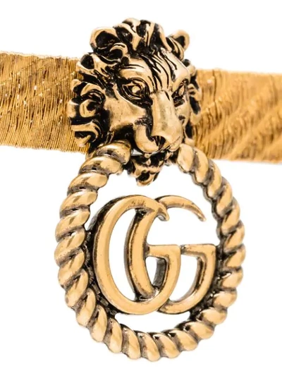 Shop Gucci Lion Head Gg Hoop Bracelet In Gold