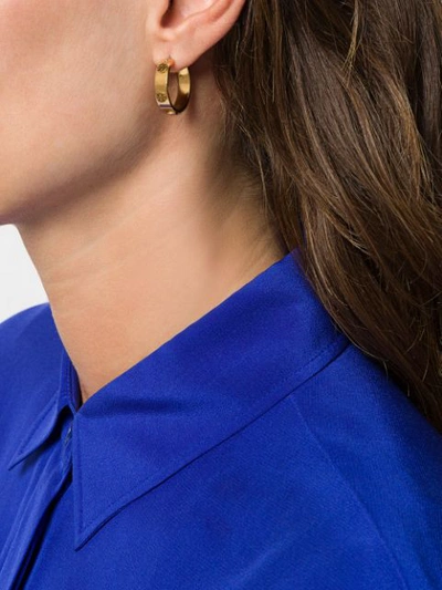 Shop Tory Burch Miller Stud Huggie Earrings In Gold