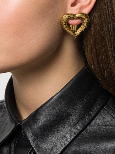 Shop Saint Laurent Heart Clip-on Earrings In Gold