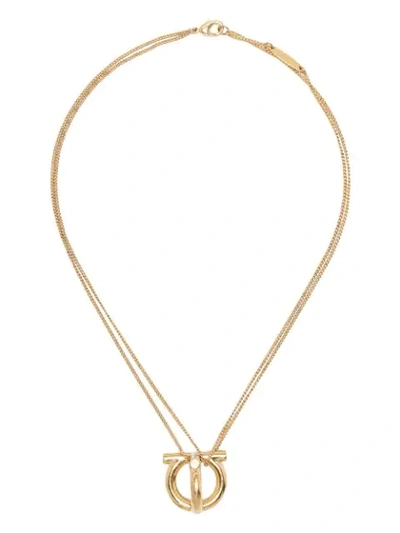 Shop Ferragamo Gancini Pendant Necklace In Gold
