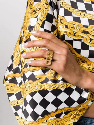 Shop Balenciaga B Logo Ring In Gold