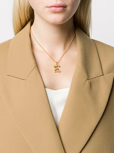 Shop Chloé Letter E Pendant Necklace In Gold