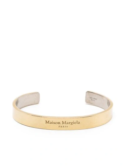 Shop Maison Margiela Logo Embossed Cuff In Gold