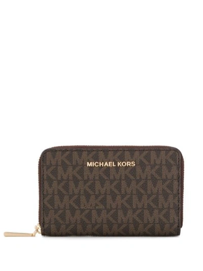 Shop Michael Michael Kors Logo-print Zip-around Wallet In Brown