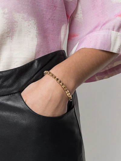 Shop Valentino Rockstud Embellished Bracelet In Gold