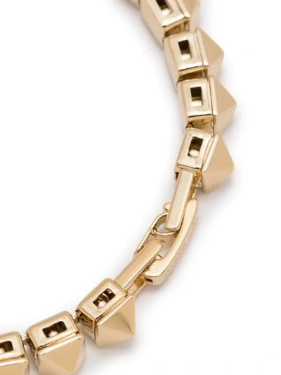 Shop Valentino Rockstud Embellished Bracelet In Gold