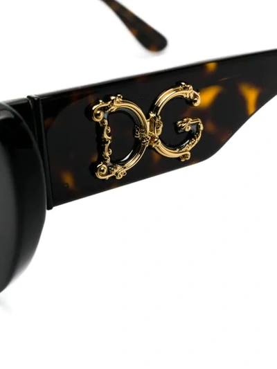 Shop Dolce & Gabbana Cat Eye Sunglasses In Brown