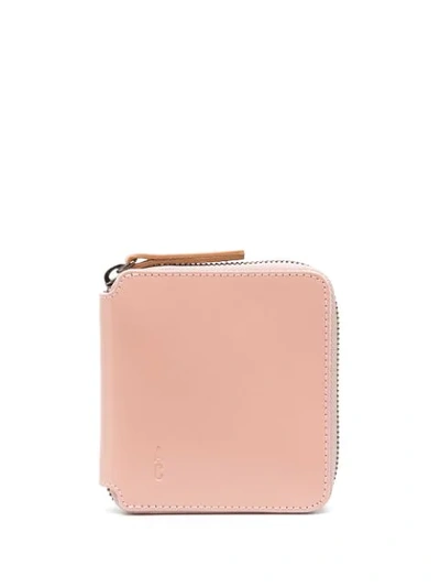 Shop Ally Capellino Logo Embossed Zipped Wallet In Pink