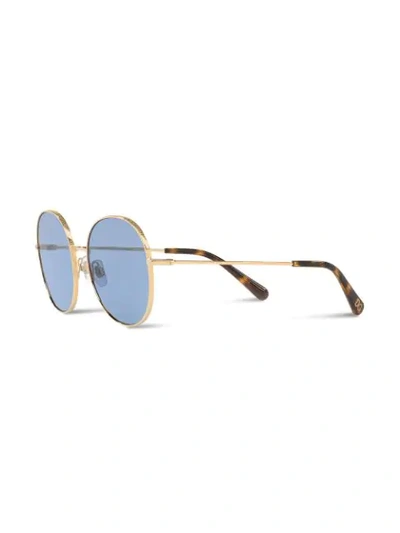 Shop Dolce & Gabbana Round Sunglasses In Gold