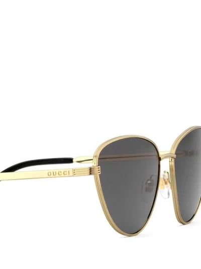 Shop Gucci Cat-eye Sunglasses In Gold