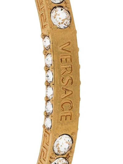 Shop Versace Greca Crystal Bangle Bracelet In Gold