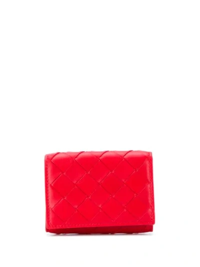 Shop Bottega Veneta Intrecciato Weave Tri-fold Wallet In Red