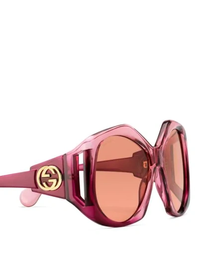 Shop Gucci Round Frame Sunglasses In Red