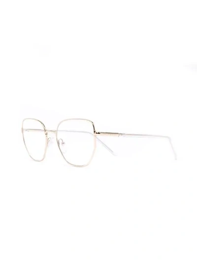 Prada Oval Wire-frame Optical Glasses In Gold