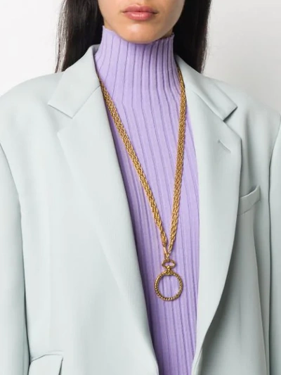 Pre-owned Chanel 1982 Loupe Long Necklace In Gold