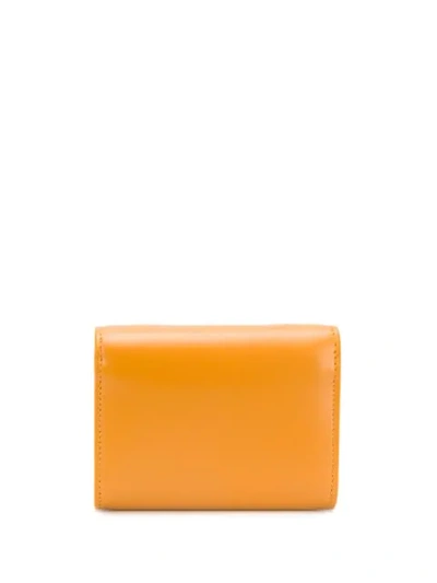 Shop Saint Laurent Logo-embossed Chain Wallet In Orange