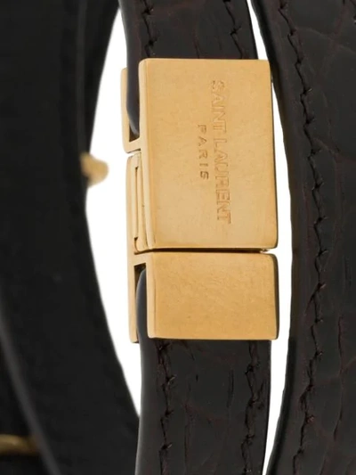 Shop Saint Laurent Opyum Leather Bracelet In Brown