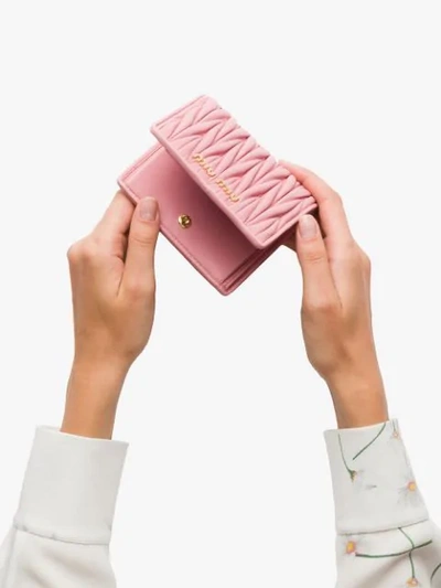 Shop Miu Miu Matelassé Leather Wallet In Pink