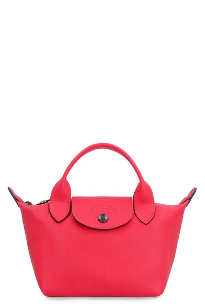 Shop Longchamp Le Pliage Cuir Mini Tote In Red