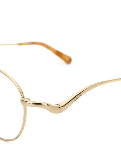 Shop Chloé Tortoiseshell Round Frame Glasses In Gold