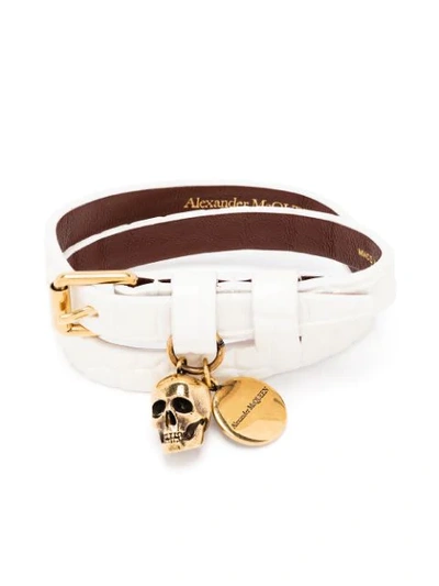 Shop Alexander Mcqueen Embossed Skull Bracelet In White