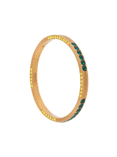 Shop Versace Crystal-embellished Engraved Bracelet In Gold