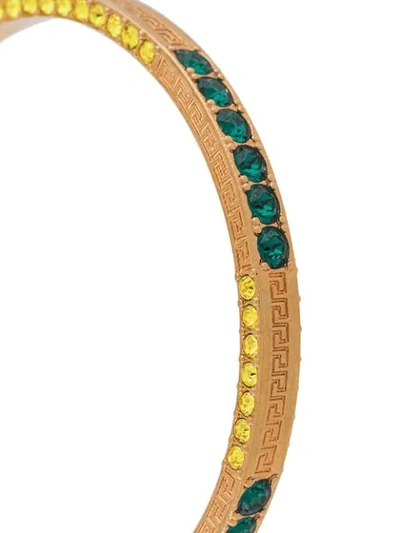 Shop Versace Crystal-embellished Engraved Bracelet In Gold