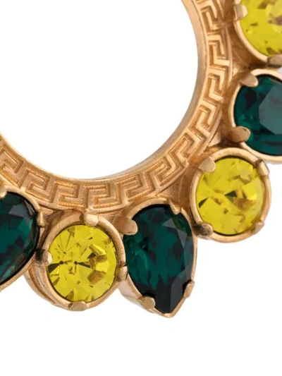 Shop Versace Bejewelled Greca Hoop Earrings In Gold