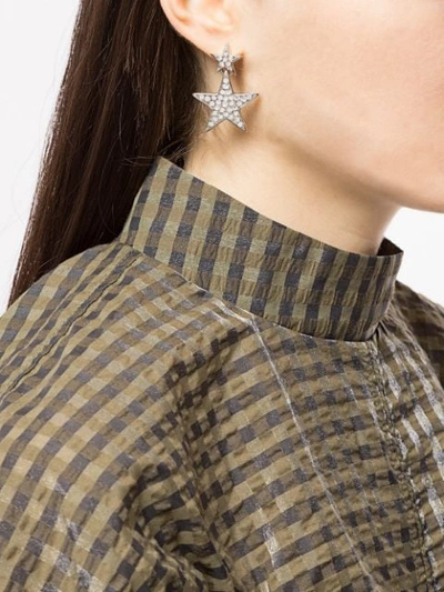 Shop Kenneth Jay Lane Asymmetric Star-shaped Earrings In Silver