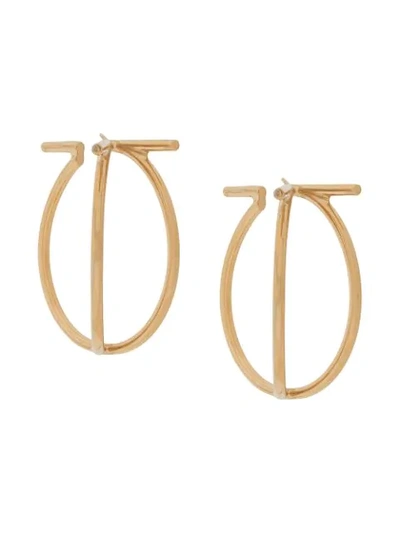 Shop Ferragamo Twisted Hoop Earrings In Gold