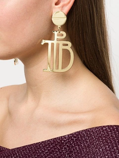 Shop Preen By Thornton Bregazzi Logo Drop Earrings In Gold