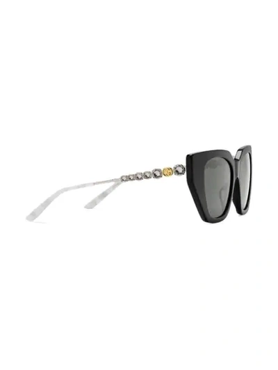 Shop Gucci Cat-eye Bejewelled Sunglasses In Black