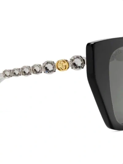 Shop Gucci Cat-eye Bejewelled Sunglasses In Black