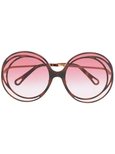 Shop Chloé Carlina Oversized Round Sunglasses In Brown