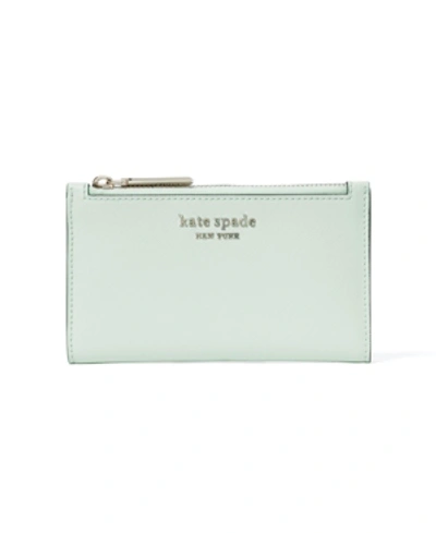 Shop Kate Spade New York Spencer Small Slim Bifold Wallet In Crystal Blue