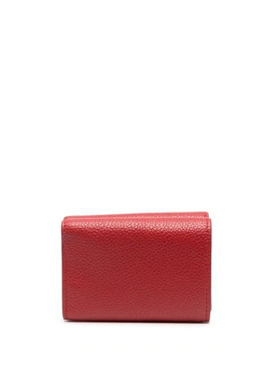 Shop Balenciaga Pebbled-texture Foldover Wallet In Red