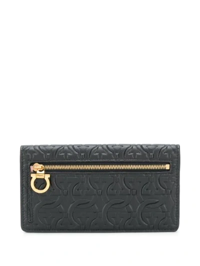 Shop Ferragamo Gancini-embossed Wallet In Black