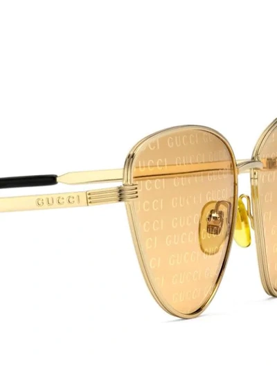 Shop Gucci Cat Eye Sunglasses In Gold