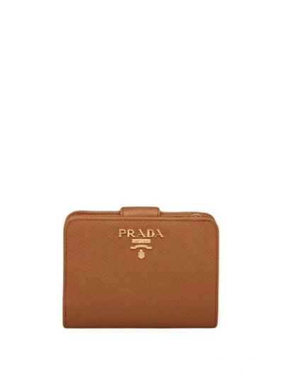 Shop Prada Logo-plaque Compact Wallet In Brown