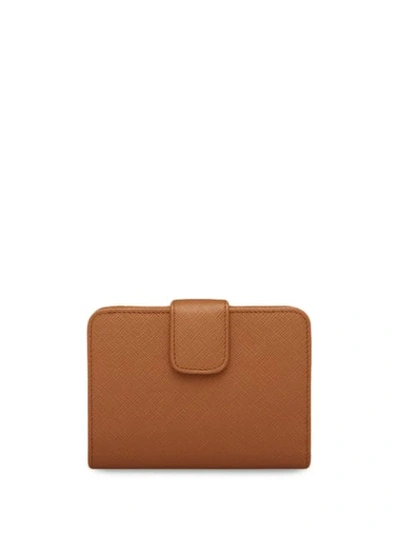 Shop Prada Logo-plaque Compact Wallet In Brown