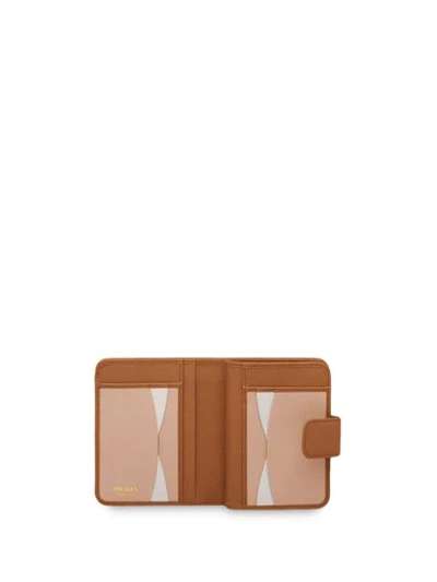 Shop Prada Logo-plaque Compact Wallet In Brown