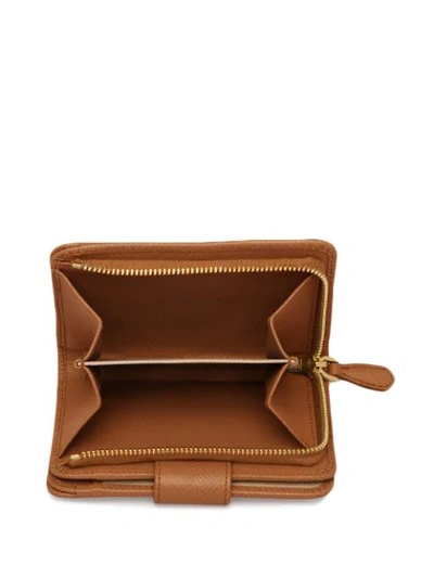 Prada Logo-plaque Compact Wallet In Brown
