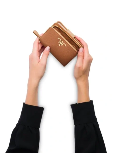 Prada Logo-plaque Compact Wallet In Brown